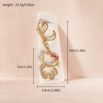 Gold Hello Kitty Keychain with Pink Bow 🎀 and Rhinestones