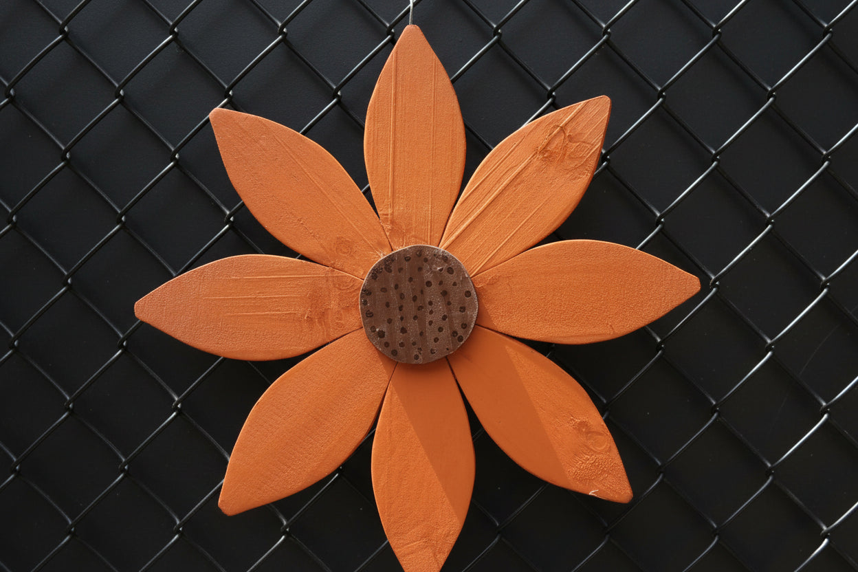 Whimsical Wooden Garden Flowers – Handcrafted Outdoor Decor for a Happy Spring Yard on a black fence.