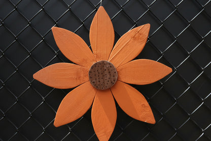 Whimsical Wooden Garden Flowers – Handcrafted Outdoor Decor for a Happy Spring Yard on a black fence.