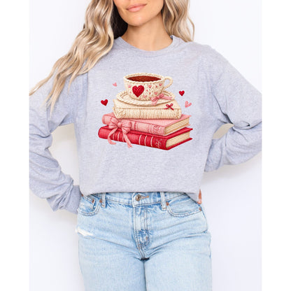 light gray sweatshirt with a graphic design of books and a coffee cup, standing against a white background.